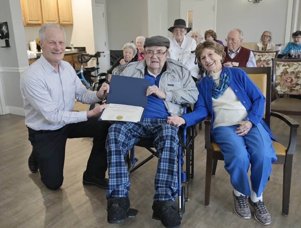 Photo of Madera County Supervisor Rob Poythress presents Bill and Bea Jones with a certificate in recognition of the couple’s 80th wedding anniversary, which was on Dec. 23, 2025. Poythress made the presentation at Cedar Creek Senior Living on Tuesday.