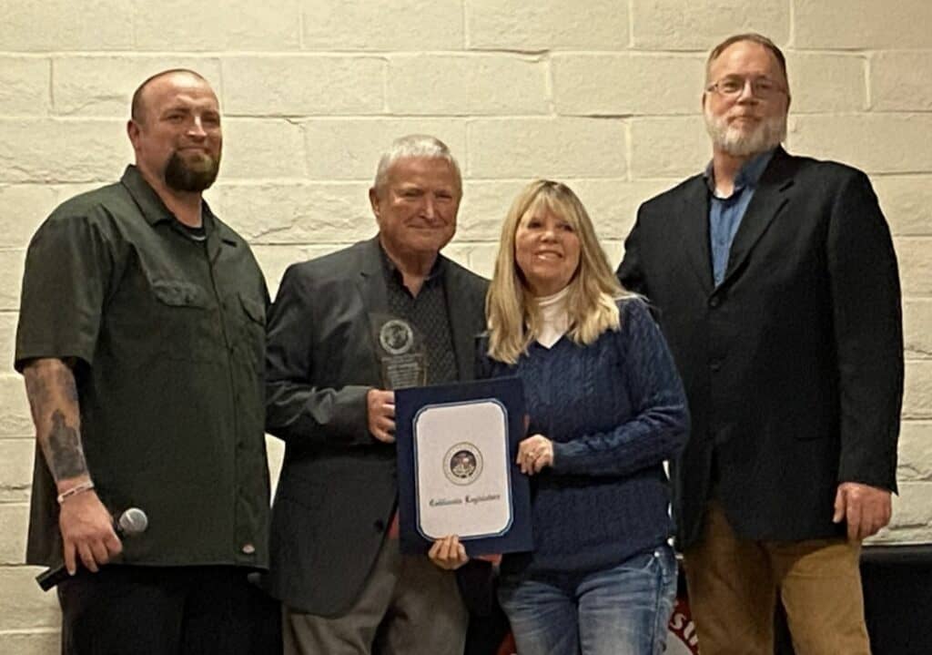 Photo of Chowchilla Chamber presents Jeff Sterling with the Unique Citizen of the Year award. From left are president Chad Middleton, Sterling, Tricia Placencia, and John Pope.
