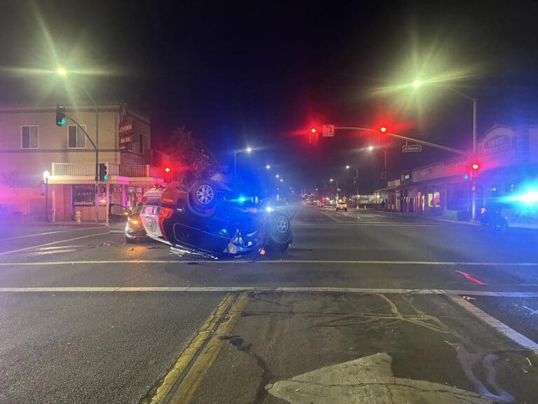 Upside-down car blocks intersection