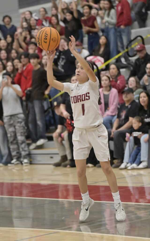 Photo of Torres’ Nevaeh Chavez launches a 3-pointer during Tuesday’s State Playoff loss to Menlo Atherton.