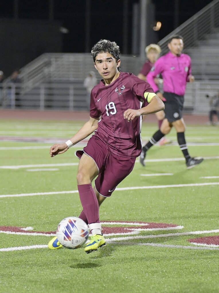Photo of Torres' Diego Jimenez controls the ball in the attacking zone in Wednesday's Div. III Championship match against Bakersfield.
