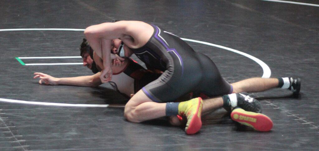 Photo of Madera South senior Emmanuel Pantoja tries to work Torres’ Kevin Franco into a pinning position. Pantoja recorded a pin over Franco to win the 132 pound match Wednesday on Senior Night. 
