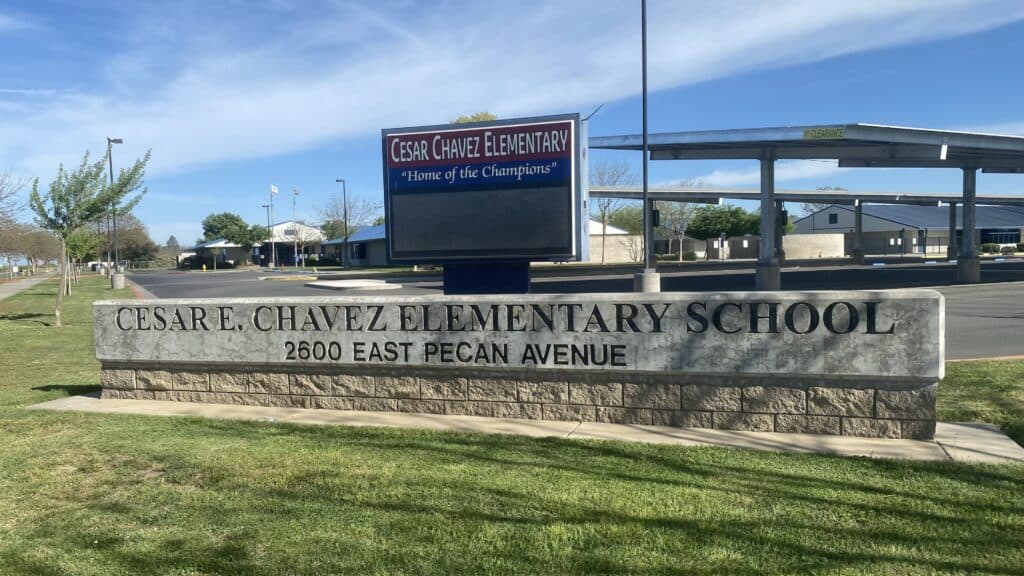 Photo of Cesar Chavez Elementary School. Cesar Chavez, an icon in the farm labor movement, was accused of sexual assault by Delores Huerta, his partner in the movement.