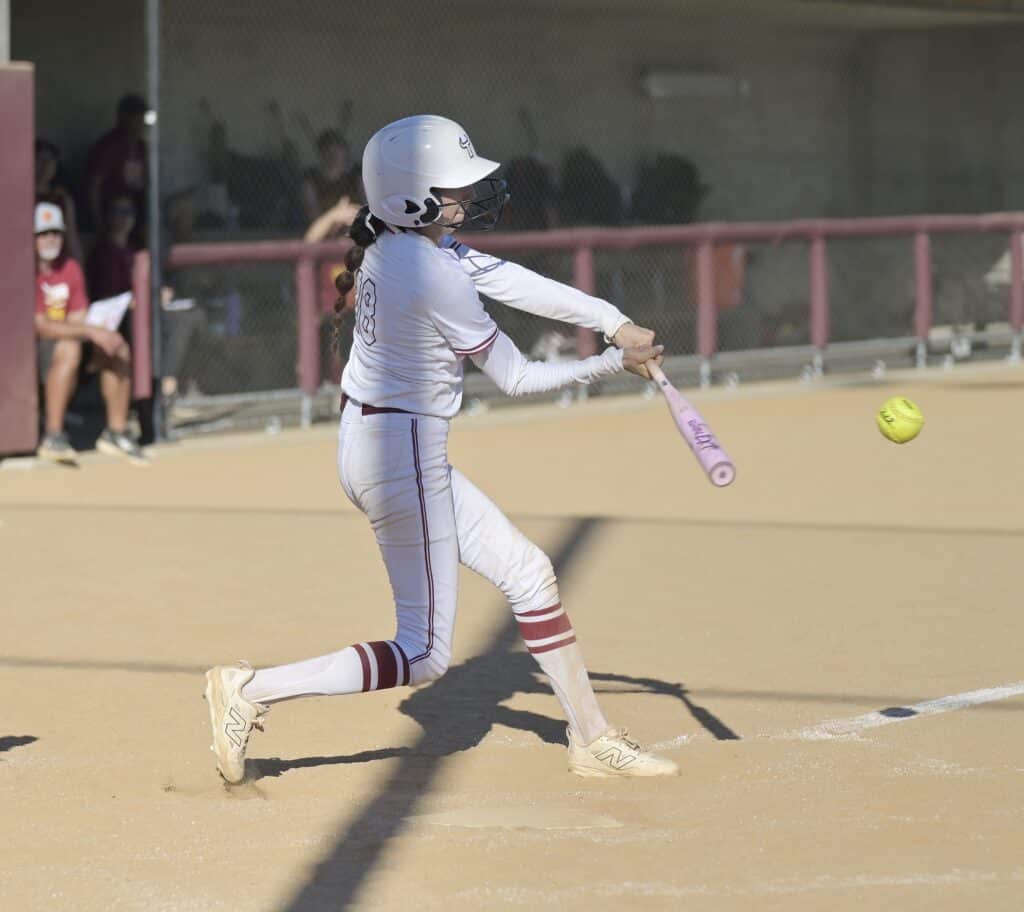 Wendy Alexander/The Madera Tribune Matilda Torres’ Ariana Garcia connects for one of her four hits in Thursday’s loss to Los Banos. He had a triple, scored two runs and drove in three more.