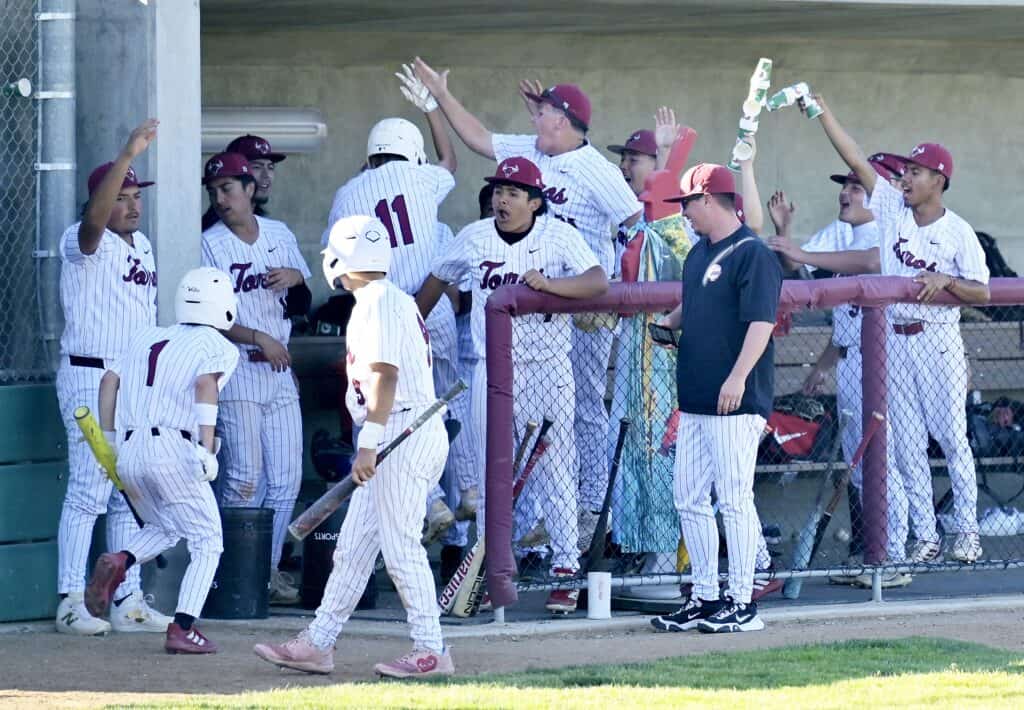 Wendy Alexander/The Madera Tribune Torres Austin Meza (11) and Trey Garcia congratulate each other after scoring on Caden Warden’s two-run triple in Wednesday’s victory over Central. 