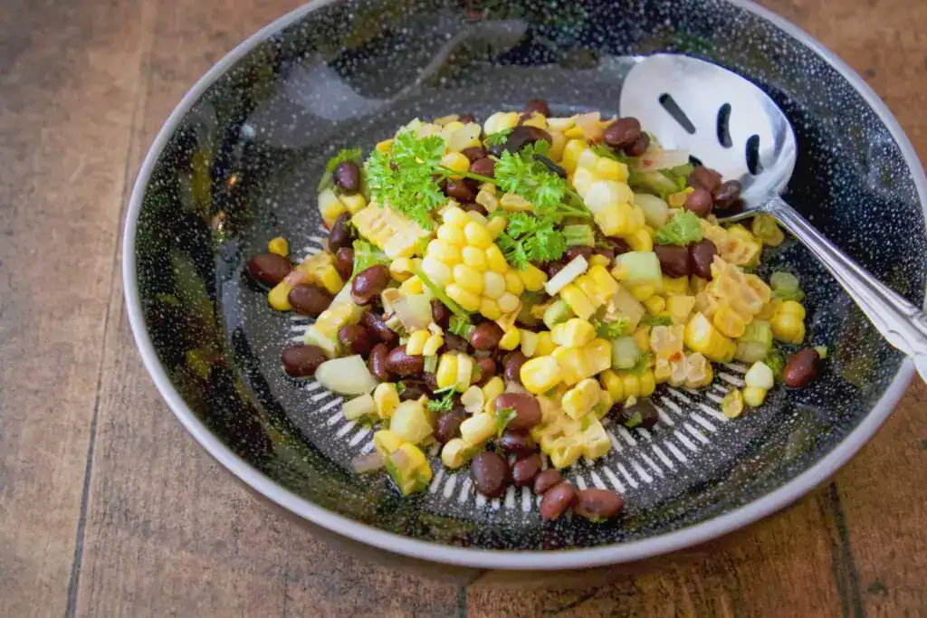 Photo - Corn and black beans go together very well. Adding some colorful bell peppers to the mix is even better.