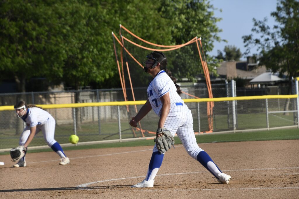 Photo - Madera’s Isabella Aguirre throws a pitch in Tuesday’s win over Sanger West. Aguirre struck out 14 batters, one short of a school record, in the victory.