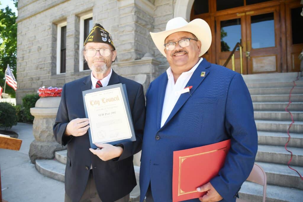 Photo - Then-Madera Mayor Santos Garcia, right, presents VFW Post 1981 Commander Tom Zonsius with a certificate of recognition for the VFW Post 1981 following the 2022 Memorial Day Service. Garcia passed away over the weekend.