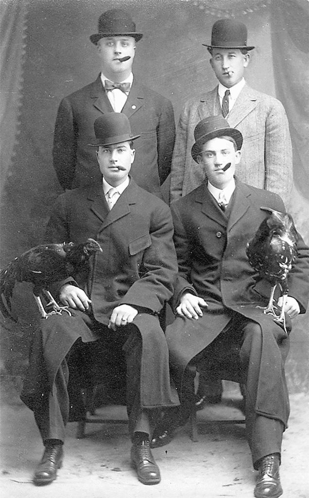 Photo - Cockfighting has always been popular in Madera. Posing with their birds before a fight in 1905 are, clockwise from top left, John Barnett, Walter Brown, Frank Barnett, and Fred Barnett. John Barnett later became sheriff of Madera County.
