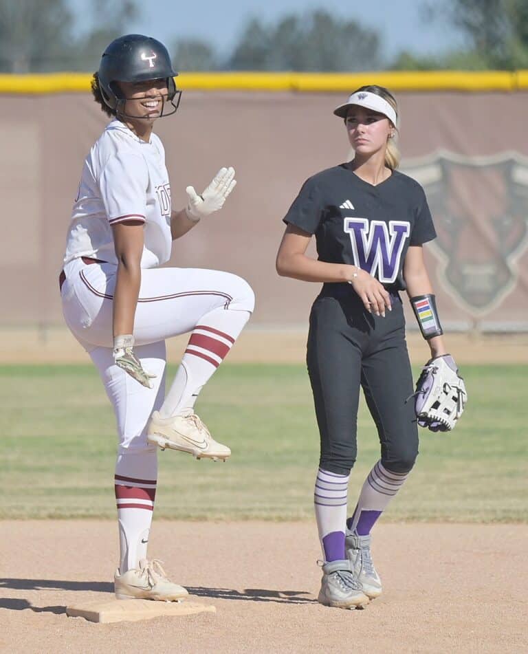 Softball teams advance to quarters