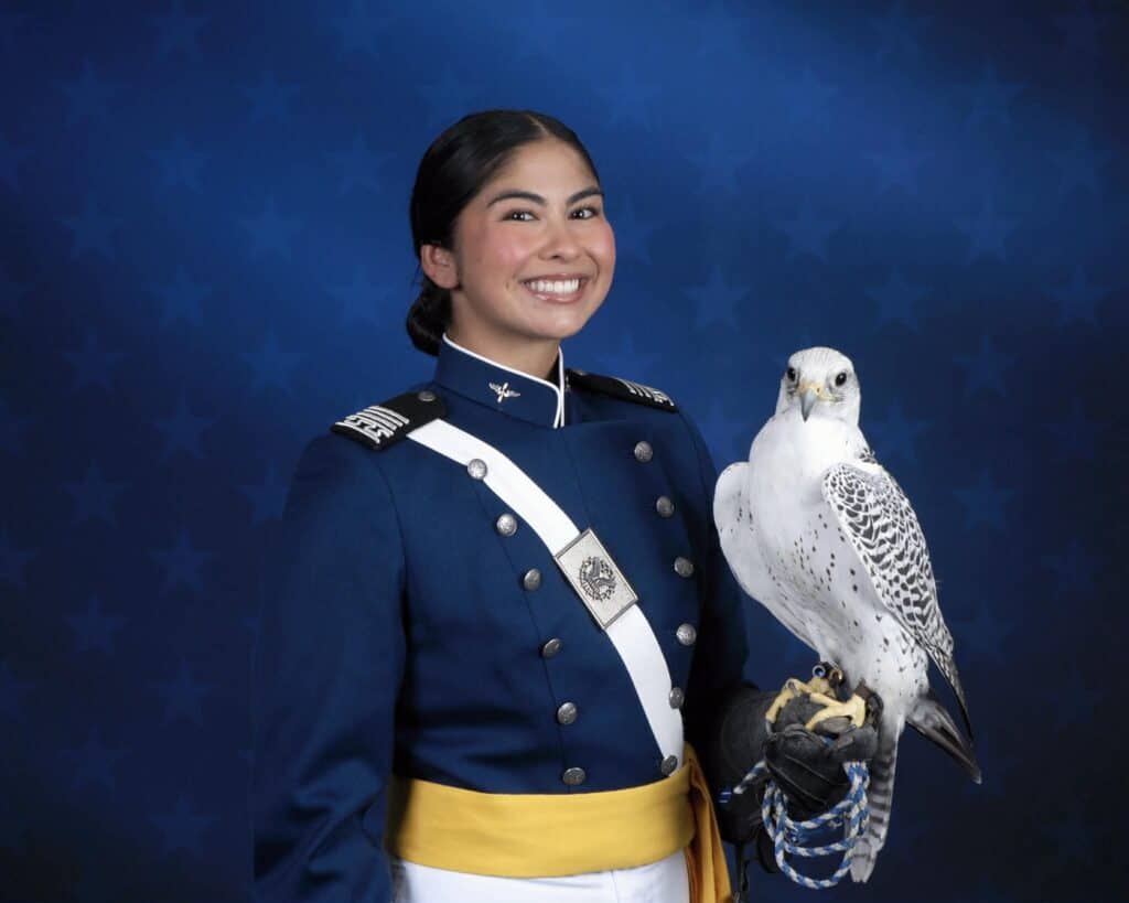 Photo - Liberty graduate Skylar Hartley holds a falcon as a member of the United States Air Force Academy’s coveted Falconry Program. The program has only 12 members and four every year are chosen for the program.