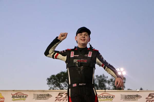 Photo - Jr. Late Model driver Lane Christensen celebrates on victory lane after his second career 51FIFTY Jr. Late Model victory at Madera Speedway on Saturday.