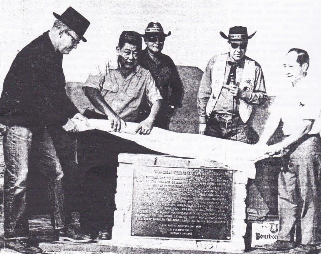 Photo - Frank Tuck, second from the left, leads a delegation of history lovers in unveiling a plaque honoring the Borden Chinese Cemetery.