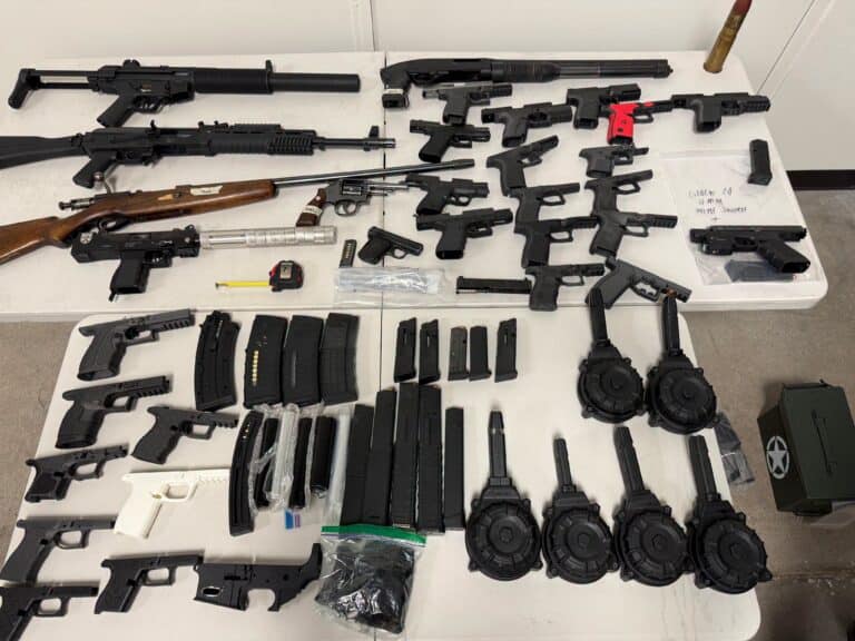 Warrant leads to multiple firearms discovery