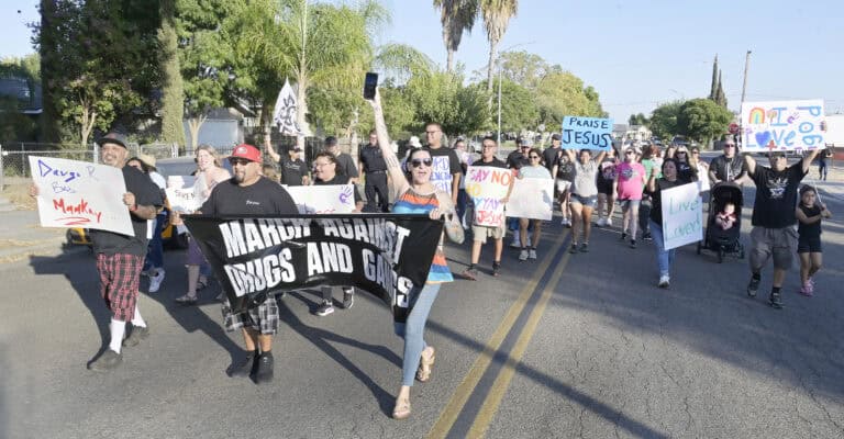 Community marches against drugs, gangs