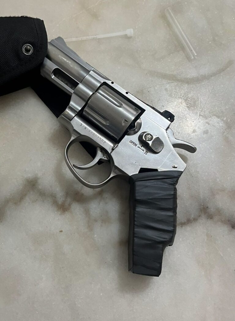 Handgun recovered in arrest
