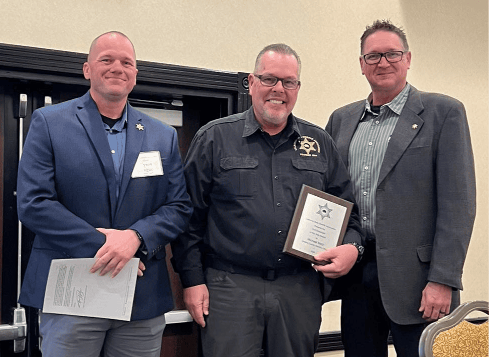 Civil Employee of the Year award presented to Motz at Madera Tribune event.