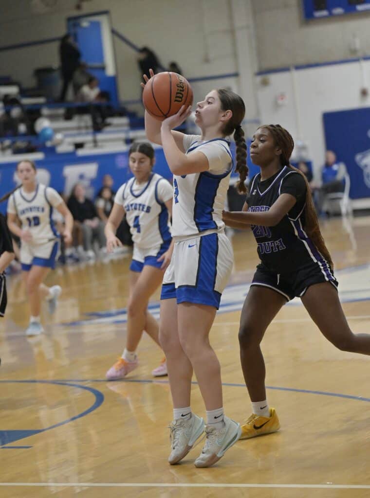 Photo of Madera’s Samantha Riché gets off a shot during the second quarter of Wednesday’s win over Madera South. Riché scored six straight points from about the same spot in the second quarter. She finished with six points in the victory.
