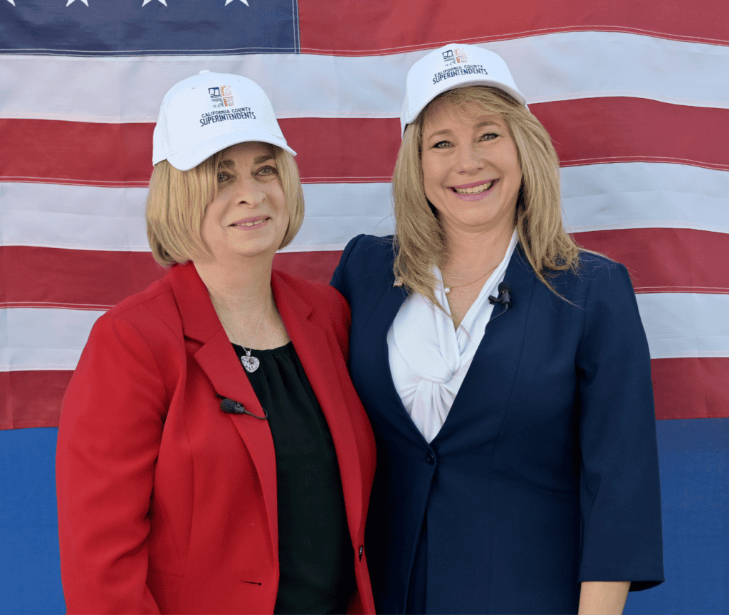 Protzman and MCSOS officials celebrate historic achievement in education.