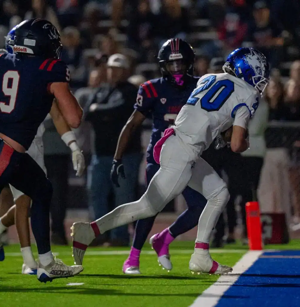 Photo - Madera’s Anthony Bursey runs into the end zone to give the Coyotes the lead in last week’s loss to San Joaquin Memorial. 