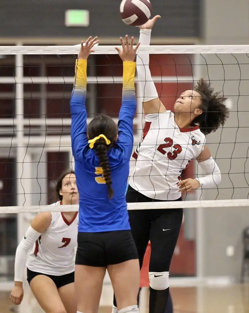 Photo - Torres’ J’Lynn Mitchell rises up to put down one of her 10 kills in Thursday’s victory over Dos Palos. 
