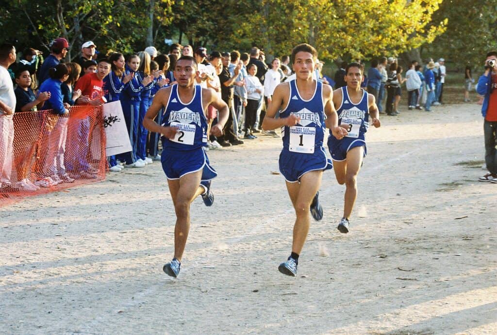 Madera Tribune athletes competing in Hall of Fame induction race outdoors.