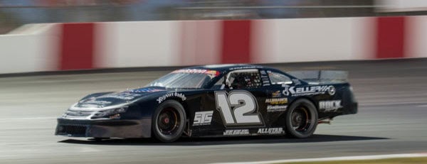 Race car number 12 driven by Keller and Longman during Speedway Summer SpeedFest.
