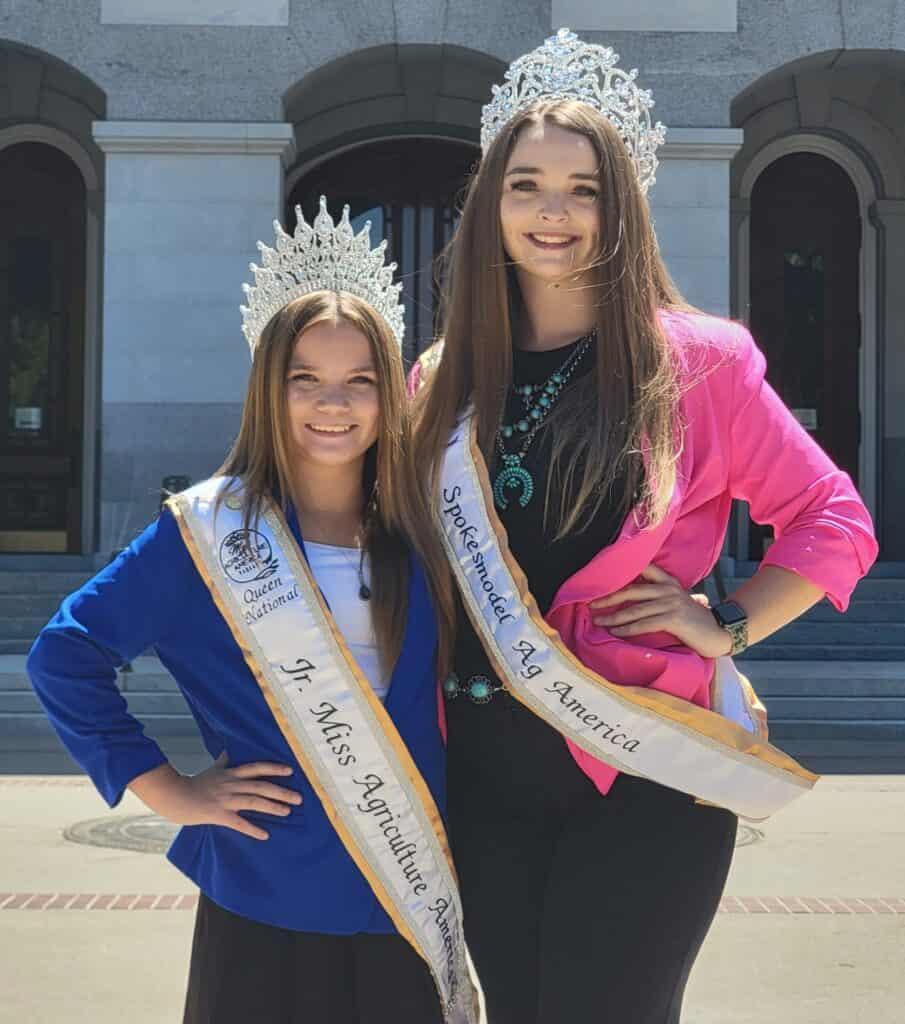 Queen advocates for agriculture at the Madera Tribune event, wearing crowns and sashes, highlighting.