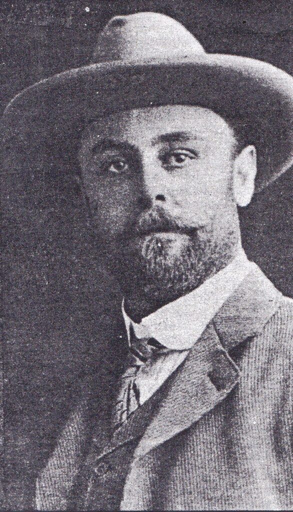 Historic photo of sheriff with hat, reflecting law enforcement history.
