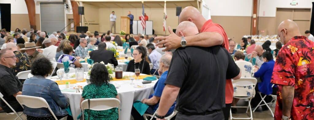 Community members gather at the Food Bank fundraiser event.