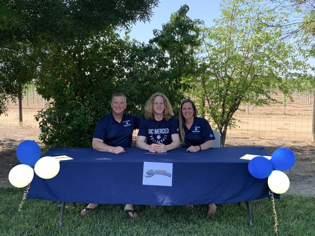 Guglielmana at UC Merced signing event with Madera Tribune coverage.