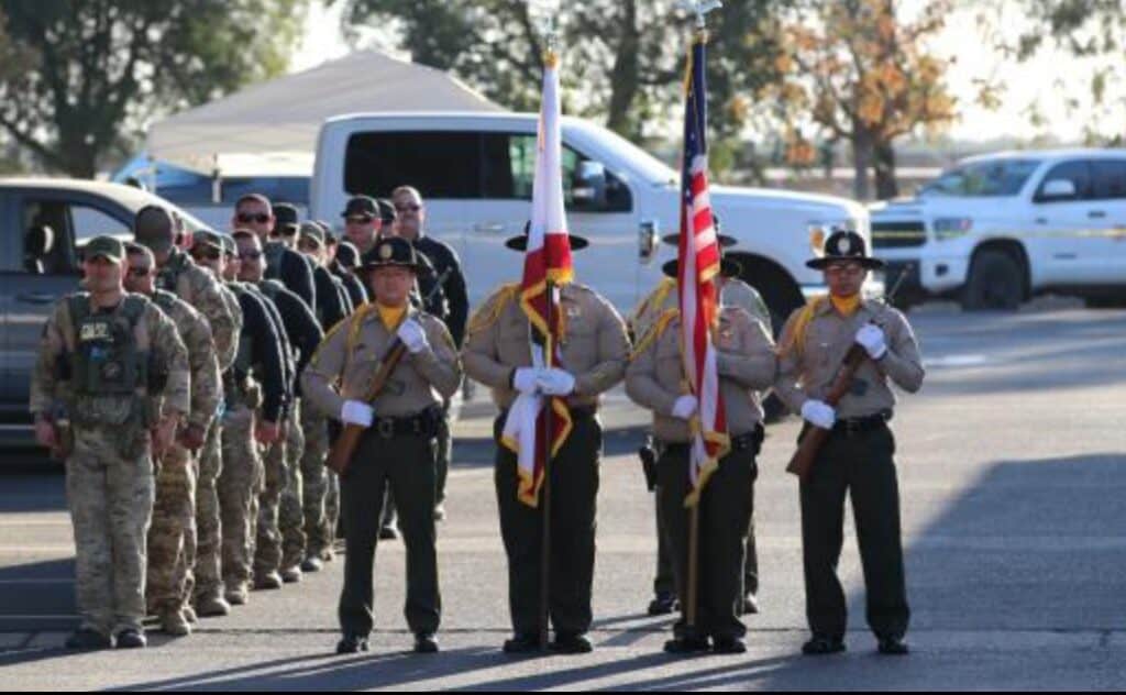 Color guard presenting flags at Family Night event in Madera.