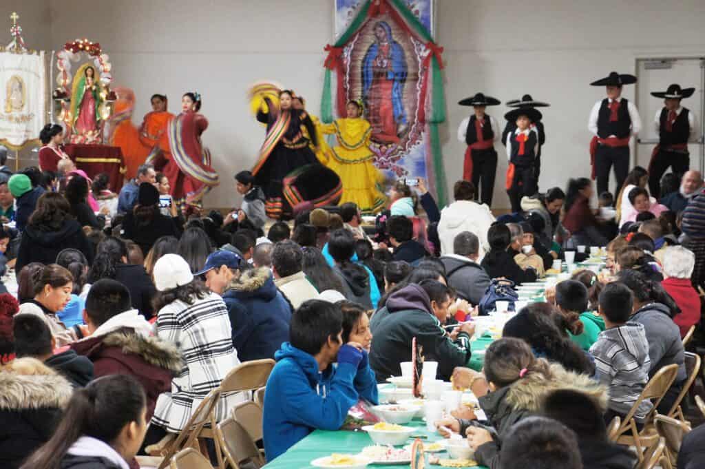 Community gathering for traditional prayer and cultural celebration in Madera.