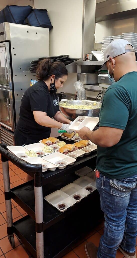 Helping evacuees receive meals at Sugar Pine during wildfire relief efforts.