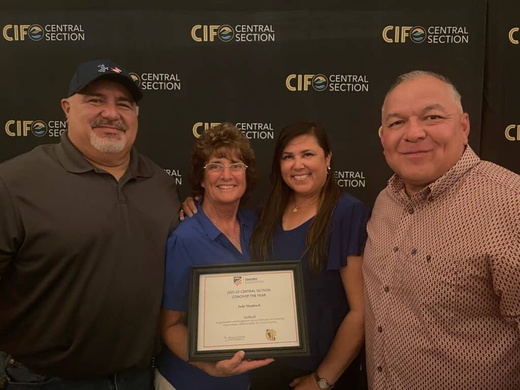 Madera coach receiving recognition at Central Section awards ceremony.