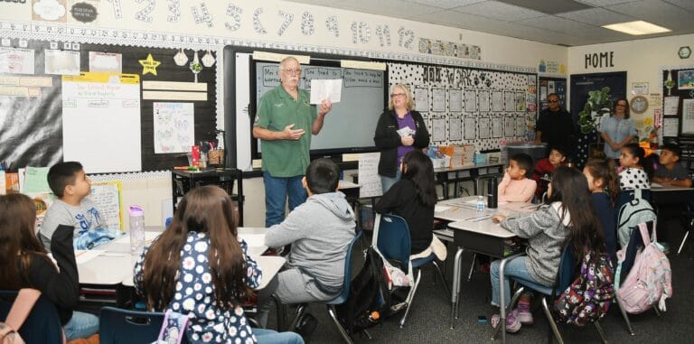 Elks donate dictionaries to third graders
