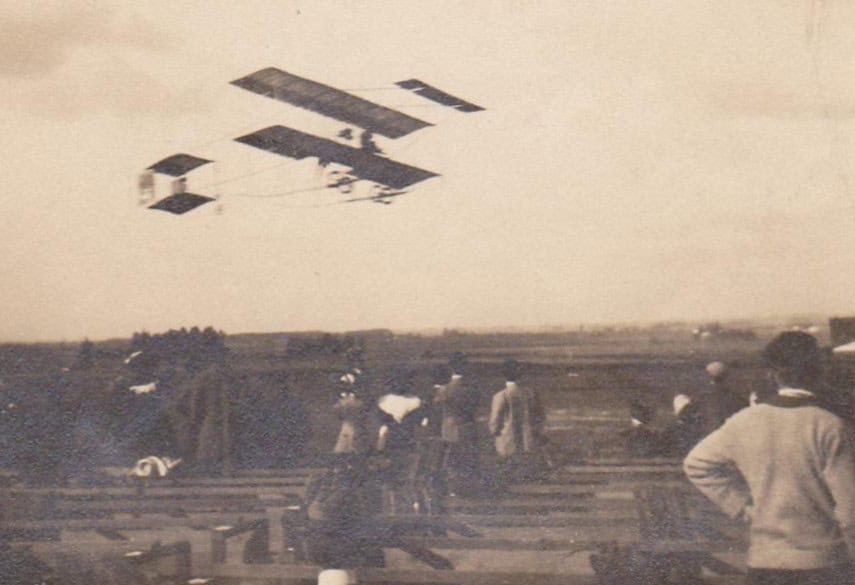 Historic first airplane landing in Madera, captured during early aviation days.