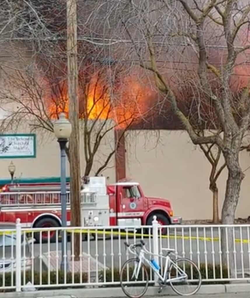 Fire truck responding to the fire at the scene.