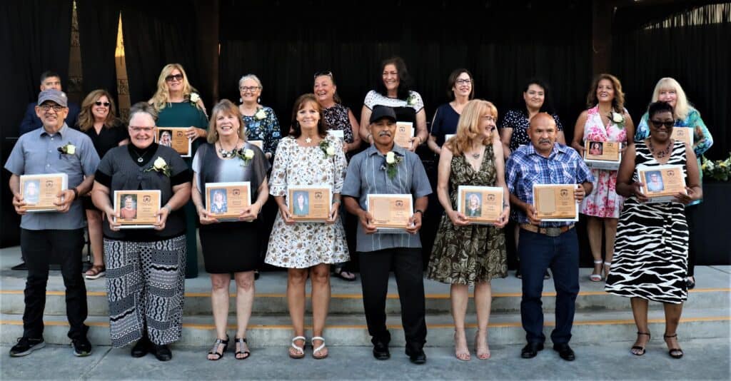 MUSD staff and retirees recognized for dedicated service at a ceremony.
