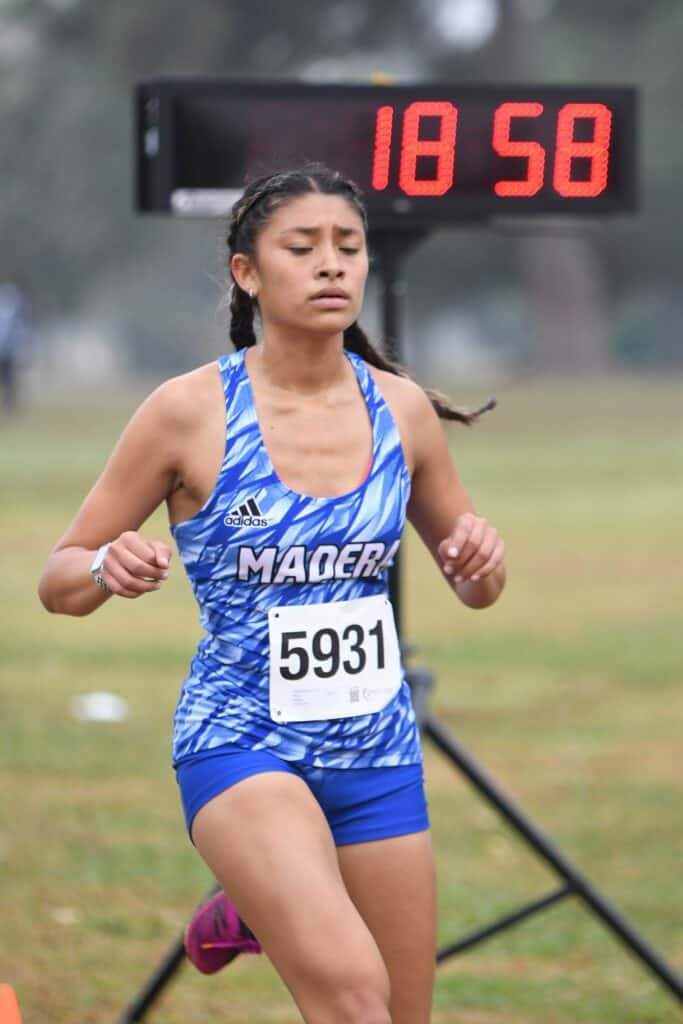 Coyote athlete competing in CMAC race, showing focus and determination during the event.