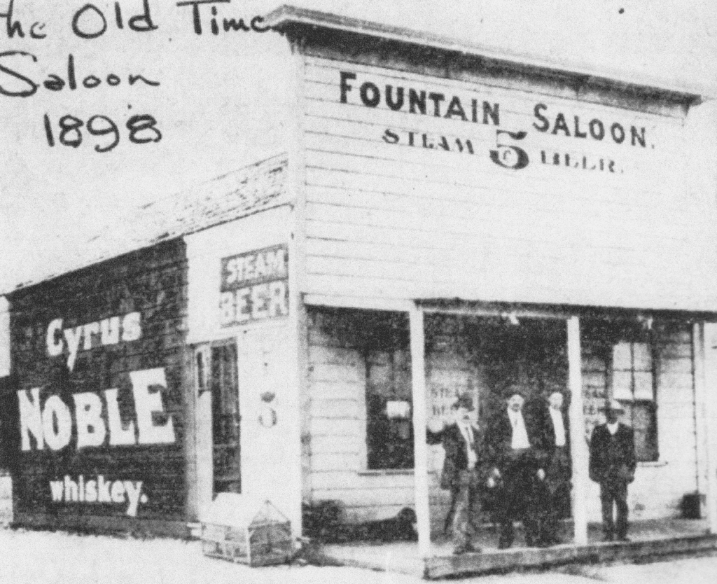 Old Fountain Saloon, 1898, with Sheriff Lewis and deputies outside.