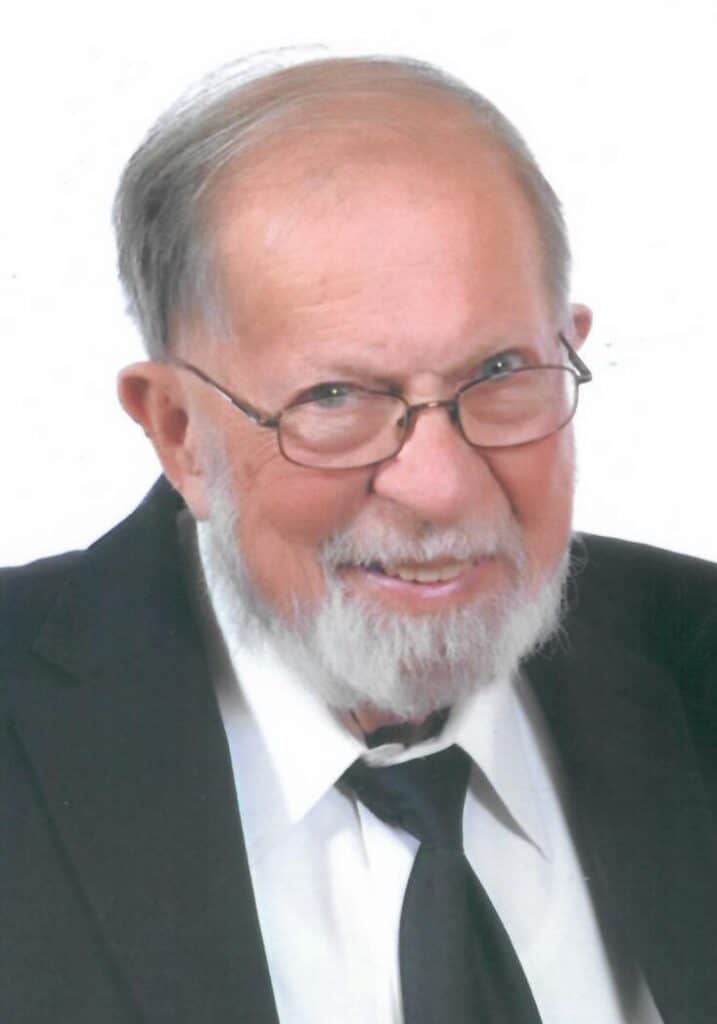 Portrait of Melvin W. Blalock, featured in The Madera Tribune obituary section.